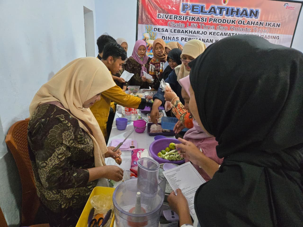 TMMD Ke-126 Kodim 0818/Malang-Batu, Dinas Perikanan Kabupaten Malang turut berperan aktif melalui kegiatan Pelatihan Diversifikasi Produk Olahan Ikan yang dilaksanakan di Aula Desa Lebakharjo